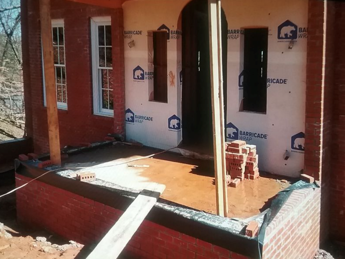 A picture containing indoor, table, sitting, window
Description automatically generated