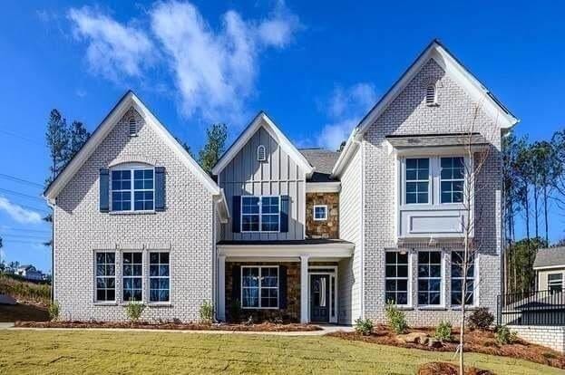 A picture containing building, outdoor, sky, grass
Description automatically generated