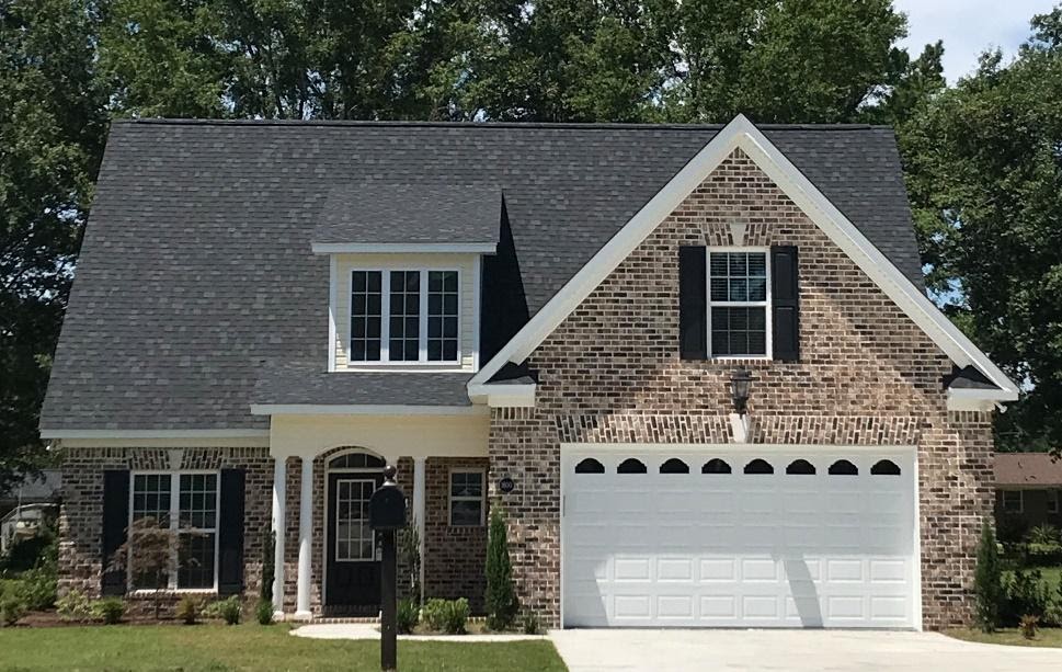 A picture containing tree, outdoor, building, house
Description automatically generated