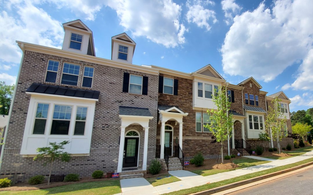 brick and stone exterior of condo building