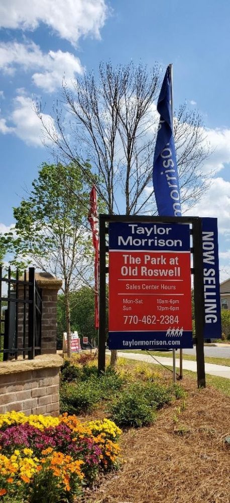 A picture containing text, outdoor, sky, tree
Description automatically generated