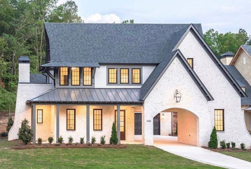 A picture containing grass, outdoor, building, sky

Description automatically generated