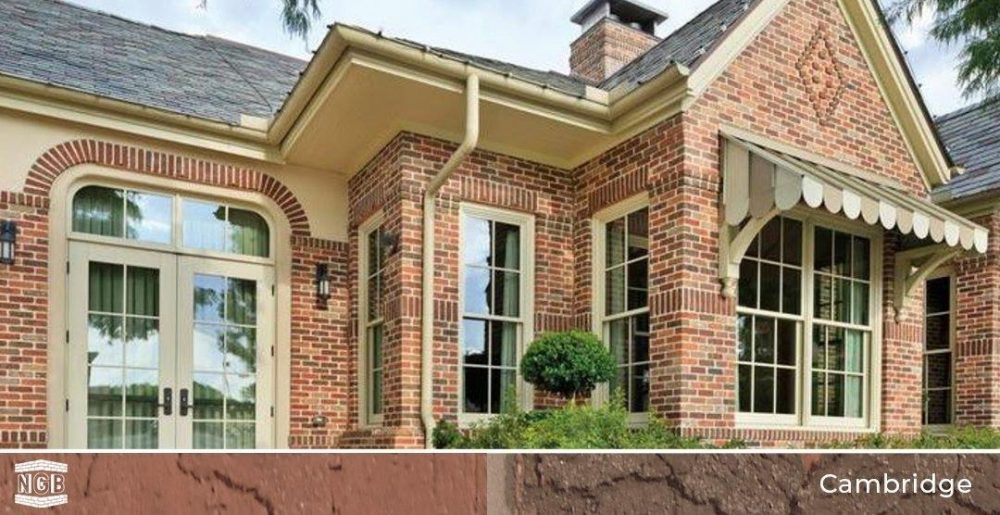 A brick building with windows
Description automatically generated with low confidence