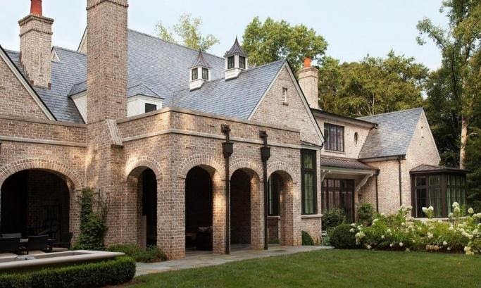 A picture containing building, outdoor, sky, grass
Description automatically generated