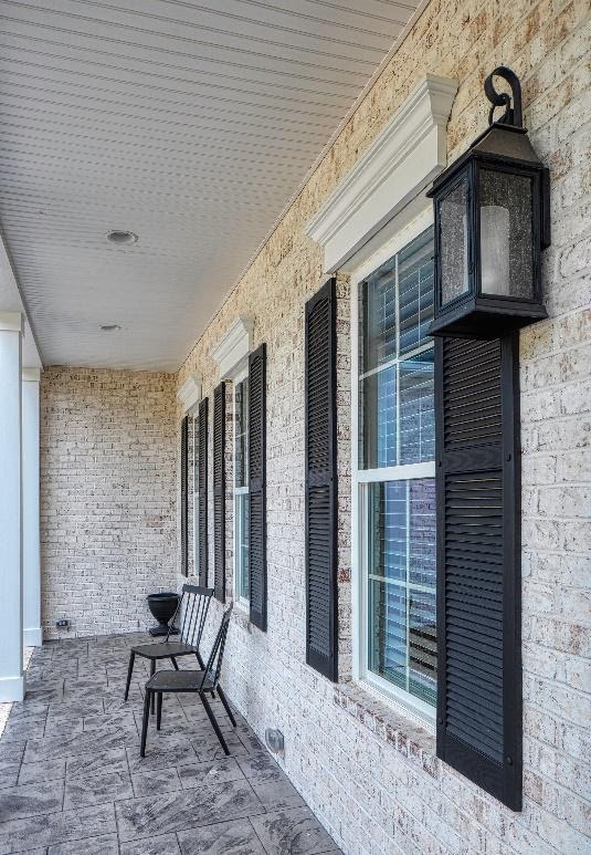 A picture containing building, stone, furniture
Description automatically generated